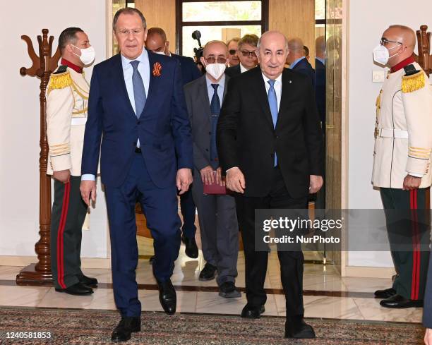 Photo of the publication published by the press service of the Algerian presidency shows that Algerian President Abdelmadjid Tebboune meets Russian...