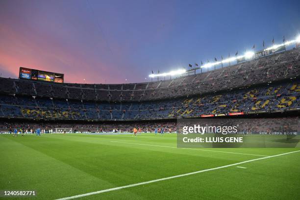General view of the Camp Nou stadium at sunset prior to the Spanish league football match between FC Barcelona and RC Celta de Vigo in Barcelona on...