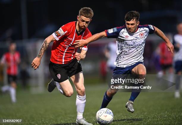 Derry , Northern Ireland - 9 May 2022; Jamie McGonigle of Derry City in action against Adam O'Reilly of St Patrick's Athletic during the SSE...