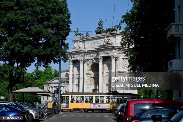 Photo taken on May 10, 2022 shows a tramway ride past the Arch of Peace made by Italian architect Luigi Cagnola, located northwest of Parco Sempione...
