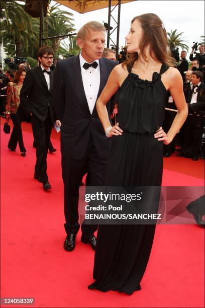 Patrick Poivre d'Arvor and his girlfriend on the stairs of 'Un conte de Noel' at the Cannes film festival In Cannes, France On May 16, 2008- Patrick...