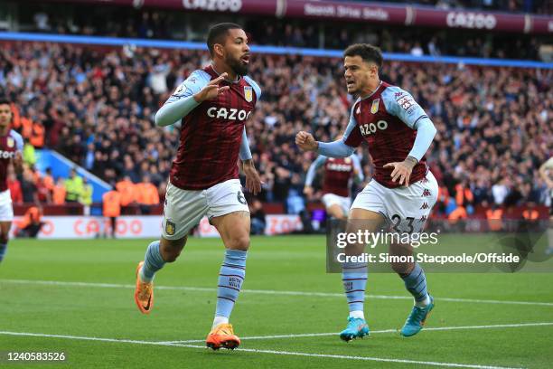 Douglas Luiz of Villa celebrates scoring the opening goal with Philippe Coutino during the Premier League match between Aston Villa and Liverpool at...