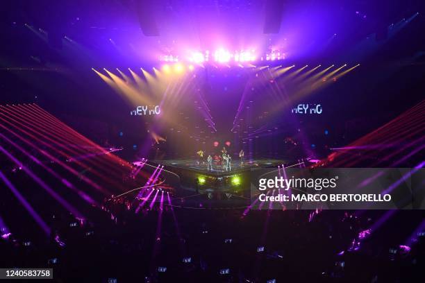 Members of the band "Zdob si Zdub & Advahov Brothers" perform on behlaf of Moldova during the first semifinal of the Eurovision Song contest 2022 on...