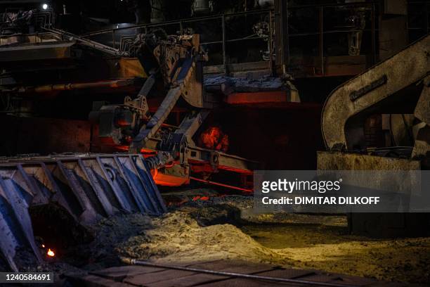 Steel worker works on the maintenance of the blast furnace at Zaporizhstal, Ukraine's third-biggest metals plan, in Zaporizhzhia on May 10 amid the...