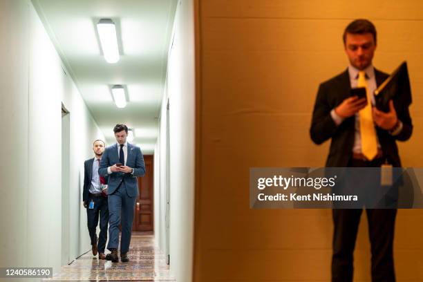 Sen. John Ossoff walks through a hallway on Capitol Hill on Tuesday, May 10, 2022 in Washington, DC.