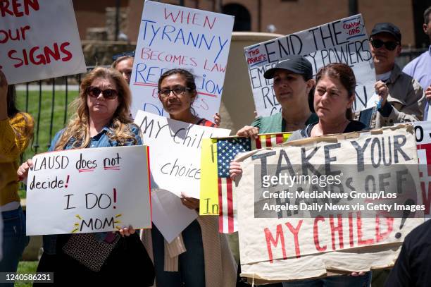 Los Angeles, CA Parents opposed to LAUSD's COVID-19 vaccination mandate for students rally outside the school district office Tuesday May 10, 2022....