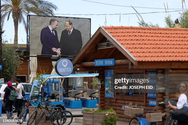 Billboard depicting the Free Patriotic Movement leader Gibran Bassil with Lebanese President Michel Aoun, in the former's northern hometwon city of...