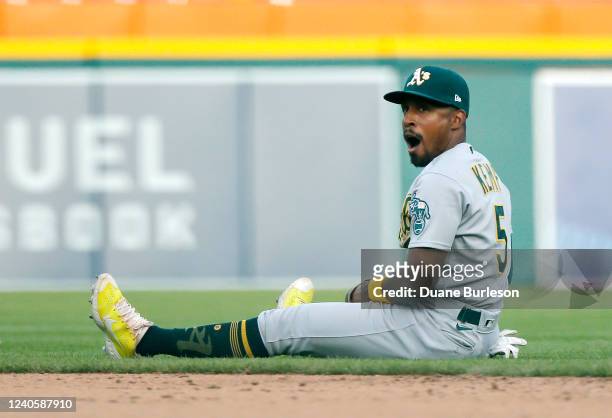 Second baseman Tony Kemp of the Oakland Athletics reacts after making a diving catch of a line drive hit by Jeimer Candelario of the Detroit Tigers...