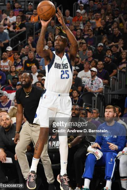 Reggie Bullock of the Dallas Mavericks shoots the ball against the Phoenix Suns during Game 5 of the 2022 NBA Playoffs Western Conference Semifinals...