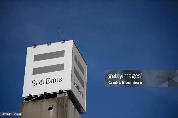 Signage displayed atop a SoftBank Corp. Store in Tokyo, Japan, on Tuesday, May 10, 2022. SoftBank Group Corp. Is scheduled to release its...