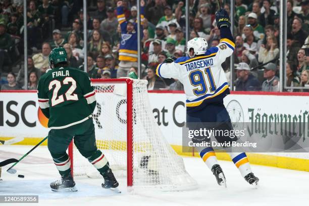 Vladimir Tarasenko of the St. Louis Blues celebrates a power play goal by teammate Ryan O'Reilly against the Minnesota Wild in the first period in...