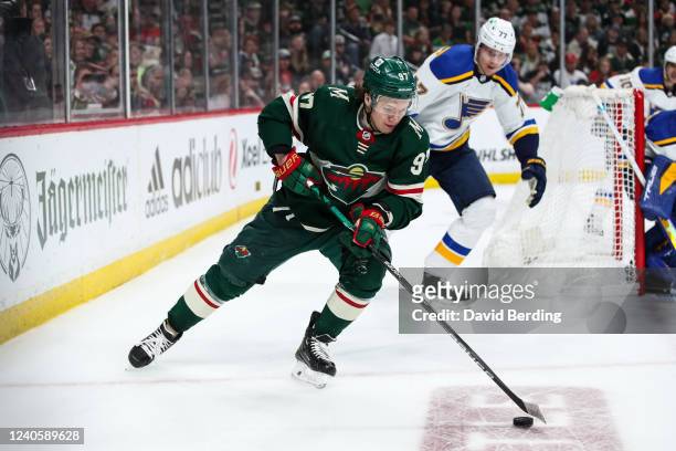 Kirill Kaprizov of the Minnesota Wild skates with the puck against the St. Louis Blues in the second period in Game Five of the First Round of the...