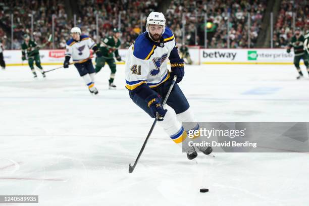 Robert Bortuzzo of the St. Louis Blues skates with the puck against the Minnesota Wild in the second period in Game Five of the First Round of the...