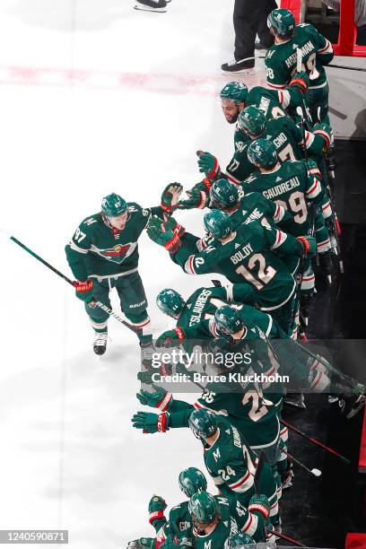 Kirill Kaprizov of the Minnesota Wild celebrates his goal with his teammates against the St. Louis Blues in Game Five of the First Round of the 2022...
