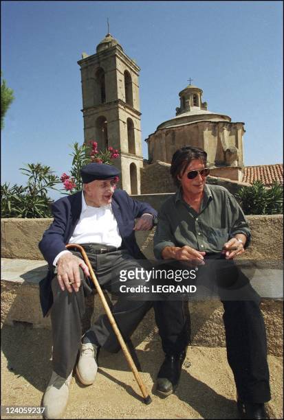 French singer and actor Jacques Dutronc In Monticello, France In June, 2002 - Jacques Dutronc and his father Pierre.