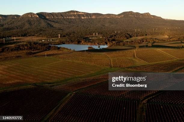 Vineyards and the Broken Back Range at sunrise in Pokolbin, New South Wales, Australia, on Saturday, May 7, 2022. The Hunter Valley is one of huge...