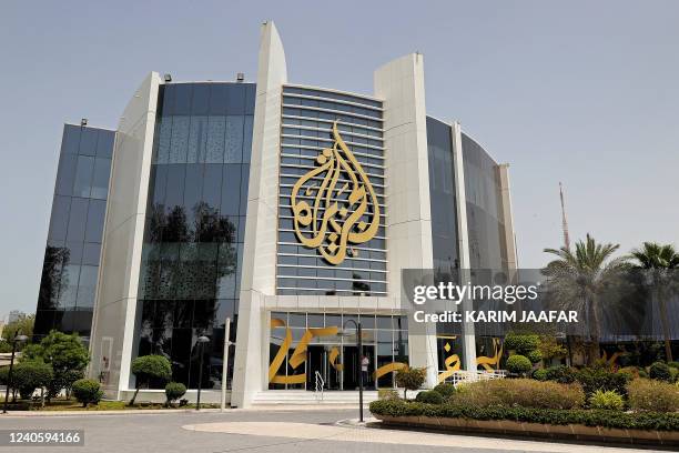 This picture taken on May 11, 2022 shows a view of the main headquarters of Qatari news broadcaster Al Jazeera in the capital Doha. - Al Jazeera...