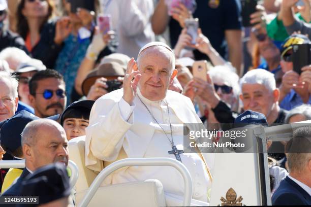 Pope Francis attends his weekly general audience in St. Peter's Square, at the Vatican, Wednesday, May 11, 2022.