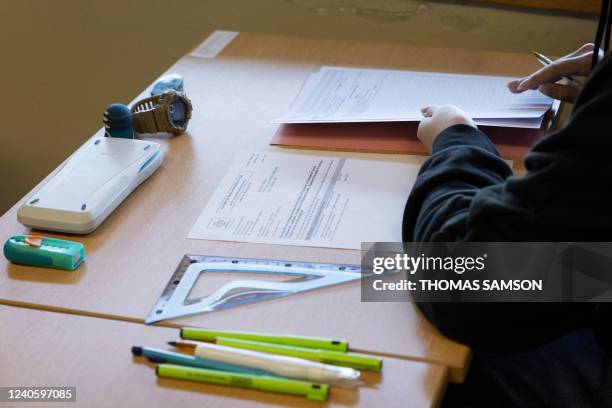 Pupil starts a test as part of the baccalaureat exams at the Lycee technique Diderot in Paris, on May 11, 2022. Some 520,000 high school students...