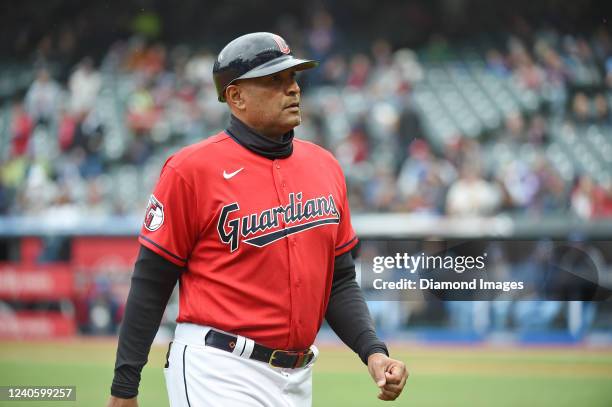 Sandy Alomar Jr. #15 of the Cleveland Guardians walks off the field after the second inning against the Toronto Blue Jays at Progressive Field on May...