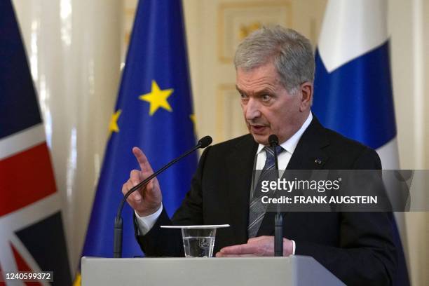 Finnish President Sauli Niinisto addresses a press conference with the British Prime Minister at the Presidential palace in Helsinki, Finland on May...