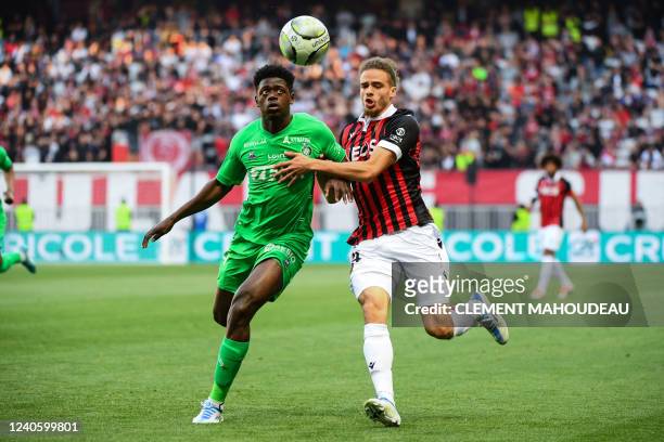 Saint-Etienne's Guinean Defender Saidou Sow challenges Nice's French forward Billal Brahimi during the French L1 football match between OGC Nice and...