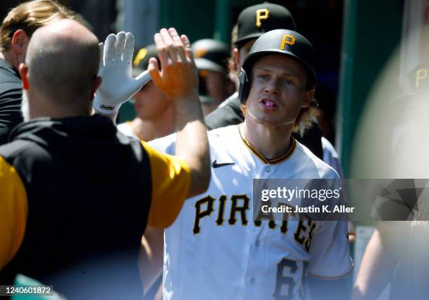 Jack Suwinski of the Pittsburgh Pirates celebrates after hitting a solo home run in the sixth inning against the Los Angeles Dodgers during the game...