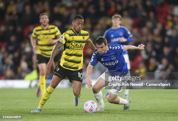 Watford's Joao Pedro and Everton's Seamus Coleman during the Premier League match between Watford and Everton at Vicarage Road on May 11, 2022 in...