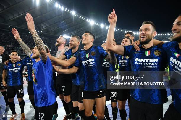 Inter Milan's Argentine forward Joaquin Correa and teammates celebrate winning the Italian Cup final football match between Juventus and Inter on May...