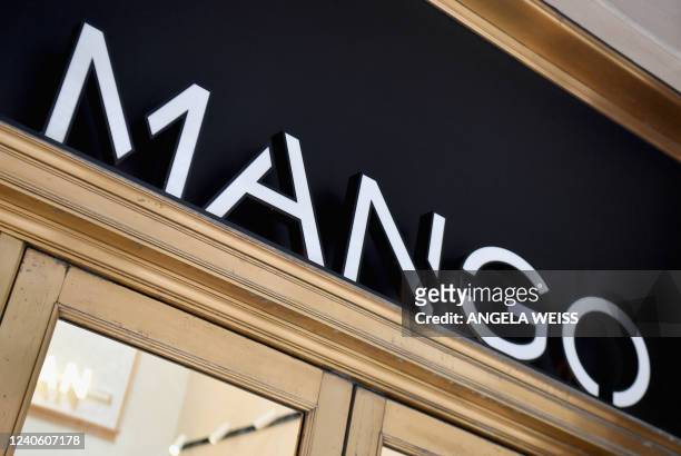 The Mango logo is seen outside the newly opened flagship store for Barcelona-based clothing company Mango on May 11, 2022 in New York City. The store...