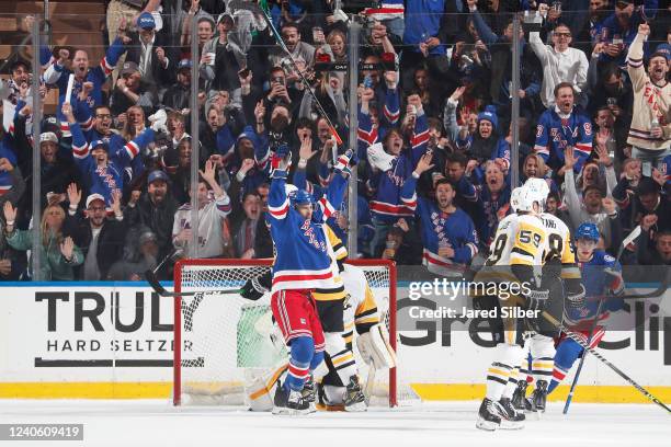 Ryan Strome of the New York Rangers celebrates teammates Adam Fox second period goal against the Pittsburgh Penguins in Game Five of the First Round...