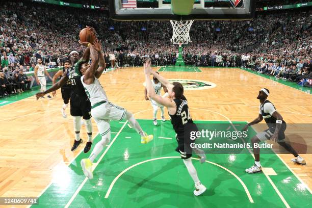 Jrue Holiday of the Milwaukee Bucks blocks the ball during Game 5 of the 2022 NBA Playoffs Eastern Conference Semifinals on May 11, 2022 at the TD...