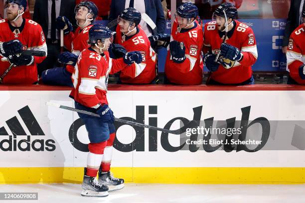 Carter Verhaeghe of the Florida Panthers celebrates his goal with teammates during the third period against the Washington Capitals in Game Five of...