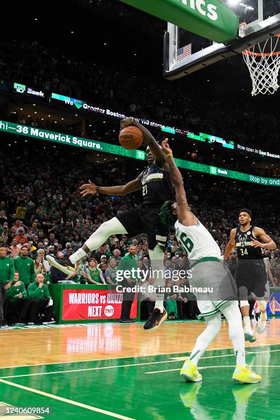 Jrue Holiday of the Milwaukee Bucks blocks a shot against the Boston Celtics during Game 5 of the 2022 NBA Playoffs Eastern Conference Semifinals on...