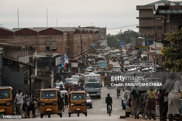 General view of a street near the city market in Bujumbura, Burundi, on March 14, 2022. - Burundi is classified as the poorest nation in the world in...
