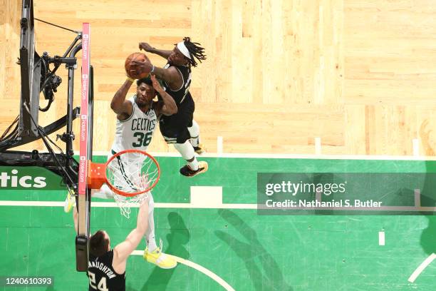 Jrue Holiday of the Milwaukee Bucks blocks the ball against the Boston Celtics during Game 5 of the 2022 NBA Playoffs Eastern Conference Semifinals...