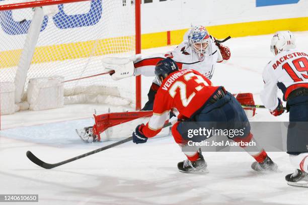 Carter Verhaeghe of the Florida Panthers scores the game winning goal past goaltender Ilya Samsonov of the Washington Capitals during third period...