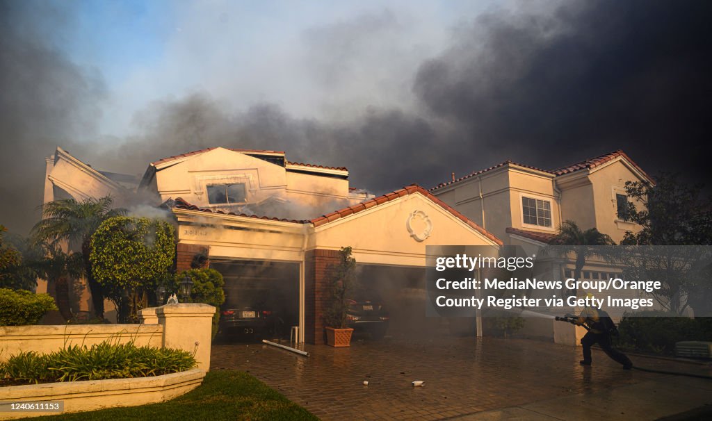 Homes destroyed as Laguna Niguel brush fire rips through Orange County coastal community