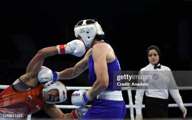 Sawety of India in action against Dawis Cary of Britain during the first round of women's 70 kg qualifying match on the third day of the...