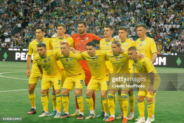 Ukraine national team pose for the pictures in the stadium of Borussia Park in Moenchengladbach, Germany on May 11, 2022 before the charity match...