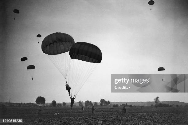 Parachutists of the armies of North Atlantic treaty organization member countries take part in the "Hold on" maneuvers in September 1952 on the...