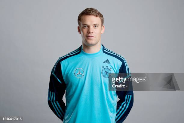 Germany's goalkeeper Manuel Neuer poses during an official photo shooting of the German national football team on November 14, 2011 in Hamburg,...
