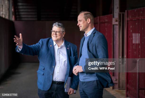 Prince William, The Duke of Cambridge walks down the tunnel at Tynecastle Park with Billy Watson, chief executive of the charity SAMH during a visit...