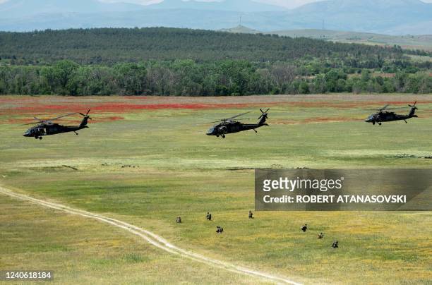 Black Hawk helicopters take part in the Swift Response 22 military exercise at the Krivolak Military Training Center in Negotino, in the centre of...
