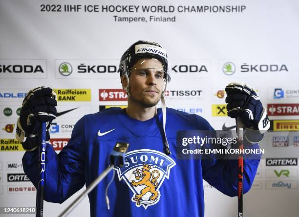 Finland's Mikko Lehtonen is interviewed after practice at the mixed zone in Tampere, Finland, on May 12, 2022 on the eve of the start of the 2022...