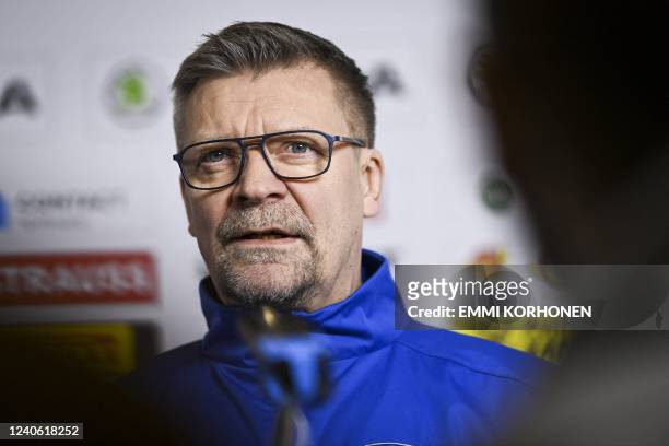 Finland's head coach Jukka Jalonen is interviewed after practice at the mixed zone in Tampere, Finland, on May 12, 2022 on the eve of the start of...