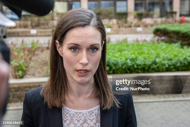 Prime Minister of Finland, Sanna Marin arrives at an EU summit, the European leaders meeting, and is doing a doorstep statement briefing with media...