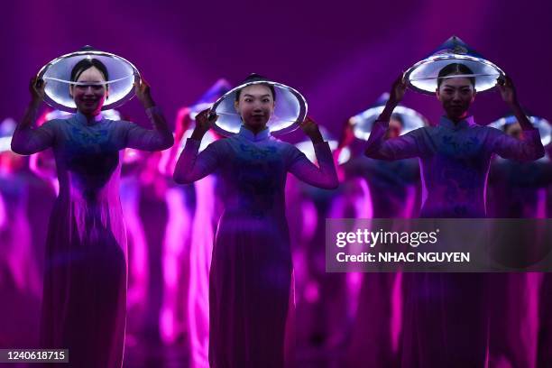 Performers take part in the opening ceremony of the 31st Southeast Asian Games at the My Dinh National Stadium in Hanoi on May 12, 2022.