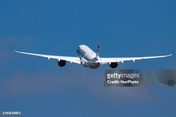 Finnair Airbus A350-900 aircraft as seen during rotation, take off and fly phase as the plane is departing from Amsterdam Schiphol Airport AMS EHAM....