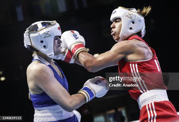 Esra Yildiz of Turkiye in action against Alessia Mesiano of Italy during women's 60 kg qualifying match of the International Boxing Association...